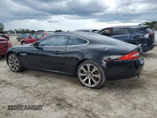 2013 Jaguar XK with VIN SAJWA4FB3DLB50331, listed as a Copart auction lot 66573384 with 109,887 mi miles and Salvage Title. Bid and sale history available at carsss.com. Image 2.