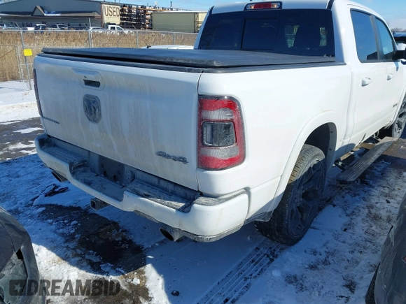 2021 Ram 1500 Limited with VIN 1C6SRFHT5MN548477, listed as a IAAI auction lot 41644894 with 51,429 mi miles and . Bid and sale history available at DreamBid. Image 4.