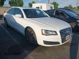 2013 Audi A8 3.0L with VIN WAURGAFD5DN009804, listed as a IAAI auction lot 42642523 with 141,252 mi miles and . Bid and sale history available at DreamBid. Image 1.