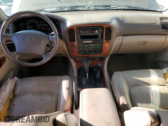 1999 Lexus LX 470 z VIN JT6HT00W0X0069481, wystawiony jako Copart lot #43588185 z przebiegiem 297 554 mil mil oraz Szkoda całkowita • Salvage title. Historia ofert i sprzedaży dostępna na DreamBid. Obrazek 8.
