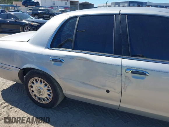 2003 Mercury Grand Marquis GS Convenience with VIN 2MEFM74W63X629935, listed as a IAAI auction lot 42048640 with 114,144 mi miles and . Bid and sale history available at DreamBid. Image 6.