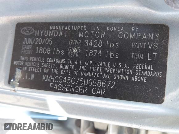 2005 Hyundai Accent GLS with VIN KMHCG45C75U658672, listed as a IAAI auction lot 42107140 with 34,351 mi miles. Bid and sale history available at carsss.com. Image 9.