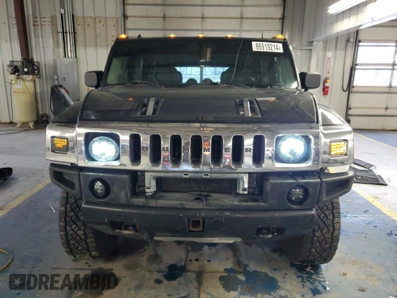 2003 Hummer H2 with VIN 5GRGN23U73H116472, listed as a Copart auction lot 86919214 with 172,543 mi miles and Salvage Title. Bid and sale history available at carsss.com. Image 5.