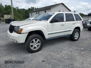 2008 Jeep Grand Cherokee Laredo with VIN 1J8GR48K18C213978, listed as a Copart auction lot 65279235 with 210,996 mi miles and Clean title. Bid and sale history available at DreamBid. Image 1.