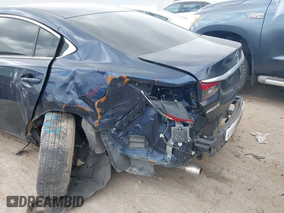 2017 Mazda Mazda6 Touring with VIN JM1GL1V54H1107722, listed as a IAAI auction lot 41521257 with 142,129 mi miles. Bid and sale history available at carsss.com. Image 6.