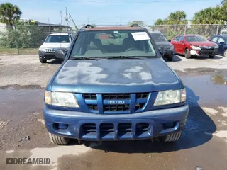 2004 Isuzu Rodeo S with VIN 4S2CK58W944317209, listed as a IAAI auction lot 41498160 with 114,764 mi miles. Bid and sale history available at carsss.com. Image 6.