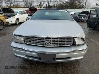 1994 Cadillac Concours z VIN 1G6KF52Y3RU231877, wystawiony jako Copart lot #82150174 z przebiegiem 76 279 mil mil oraz Szkody całkowita. Historia ofert i sprzedaży dostępna na DreamBid. Obrazek 5.
