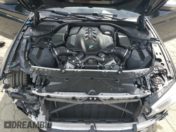 2020 BMW 5 Series M550i xDrive z VIN WBAJS7C09LCE11953, wystawiony jako Copart lot #49773175 z przebiegiem 40 329 mil mil oraz Szkoda całkowita • Salvage title. Historia ofert i sprzedaży dostępna na DreamBid. Obrazek 13.