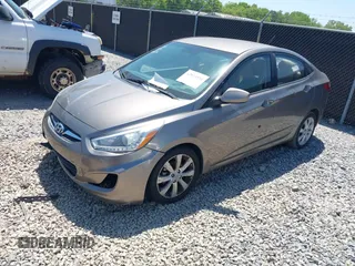 2014 Hyundai Accent GLS with VIN KMHCU4AE7EU736691, listed as a IAAI auction lot 42054514 with 80,715 mi miles and . Bid and sale history available at carsss.com. Image 2.
