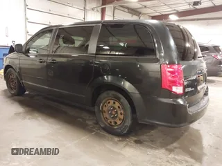 2015 Dodge Grand Caravan SXT with VIN 2C4RDGCG8FR518739, listed as a IAAI auction lot 41704911 with 278,478 mi miles and . Bid and sale history available at DreamBid. Image 3.