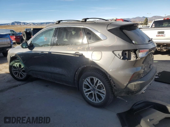 2021 Ford Escape SEL Hybrid z VIN 1FMCU9CZ9MUA86970, wystawiony jako Copart lot #84290064 z przebiegiem 32 019 mil mil oraz Szkoda całkowita • Salvage title. Historia ofert i sprzedaży dostępna na DreamBid. Obrazek 2.