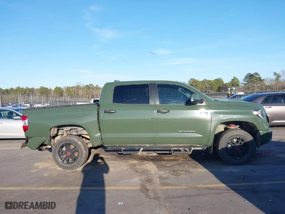 2020 Toyota Tundra 4WD SR5 with VIN 5TFDY5F13LX871896, listed as a IAAI auction lot 41497515 with 128,596 mi miles. Bid and sale history available at carsss.com. Image 13.
