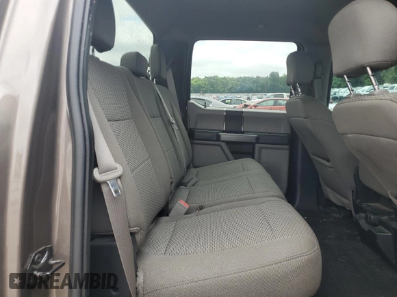 2018 Ford F-150 XL с VIN 1FTEW1E5XJFC79289, выставлен на аукционе Copart как лот 61224445 с пробегом 125 574 миль миль и Списание • Salvage title. История ставок и продаж доступна на DreamBid. Изображение 10.