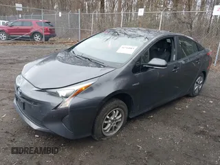 2018 Toyota Prius Two z VIN JTDKBRFU7J3065008, wystawiony jako IAAI lot #41744883 z przebiegiem 94 031 mil mil oraz . Historia ofert i sprzedaży dostępna na DreamBid. Obrazek 2.