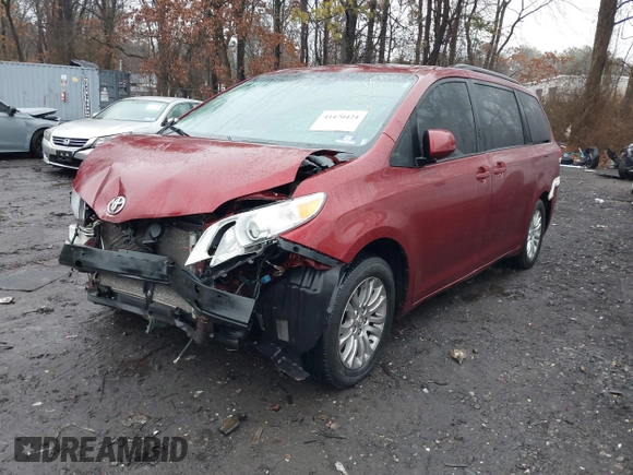 2014 Toyota Sienna XLE with VIN 5TDYK3DC0ES510579, listed as a IAAI auction lot 41470424 with 304,620 mi miles and . Bid and sale history available at DreamBid. Image 18.
