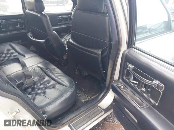 1991 Cadillac Seville z VIN 1G6KS53B2MU813855, wystawiony jako IAAI lot #42425470 z przebiegiem 168 194 mil mil oraz . Historia ofert i sprzedaży dostępna na DreamBid. Obrazek 8.