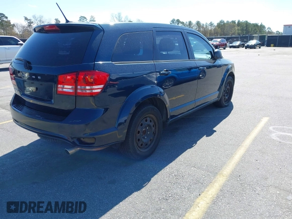 2014 Dodge Journey American Value Pkg with VIN 3C4PDCAB4ET103534, listed as a IAAI auction lot 41805531 with 175,310 mi miles. Bid and sale history available at carsss.com. Image 4.