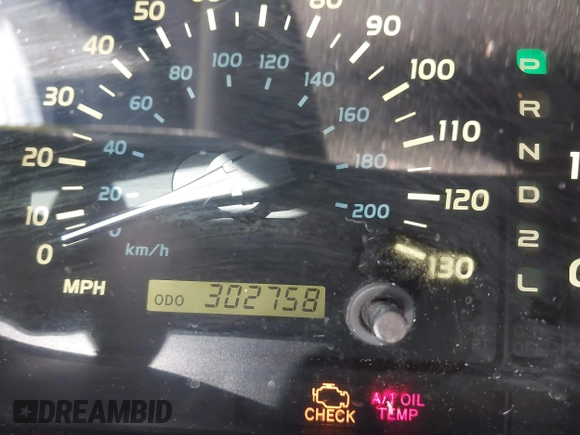 2000 Lexus LX 470 with VIN JT6HT00WXY0079873, listed as a IAAI auction lot 41605770 with 302,758 mi miles and . Bid and sale history available at DreamBid. Image 7.
