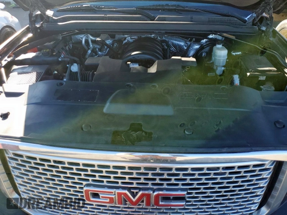2015 GMC Yukon Denali with VIN 1GKS1CKJ7FR132677, listed as a Copart auction lot 47820925 with 144,821 mi miles and Salvage Title. Bid and sale history available at carsss.com. Image 12.
