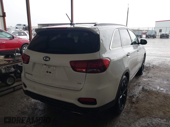 2019 Kia Sorento LX z VIN 5XYPG4A57KG609790, wystawiony jako IAAI lot #42199013 z przebiegiem 83 091 mil mil oraz . Historia ofert i sprzedaży dostępna na DreamBid. Obrazek 4.
