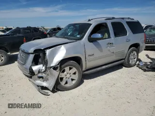 2013 GMC Yukon SLT with VIN 1GKS1CE04DR326616, listed as a Copart auction lot 48969795 with 144,809 mi miles and Salvage Title. Bid and sale history available at carsss.com. Image 1.