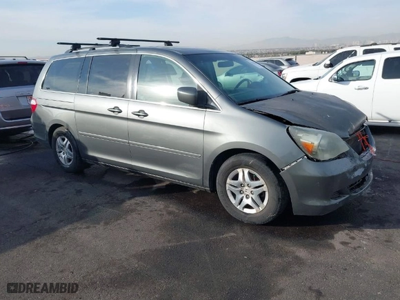 2007 Honda Odyssey EX-L with VIN 5FNRL38707B089954, listed as a IAAI auction lot 41410866 with 221791 miles. Bid and sale history available at carsss.com. Image 1.