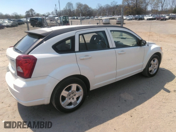 2009 Dodge Caliber SXT with VIN 1B3HB48A19D259105, listed as a IAAI auction lot 41881974 with 127,096 mi miles and . Bid and sale history available at DreamBid. Image 4.