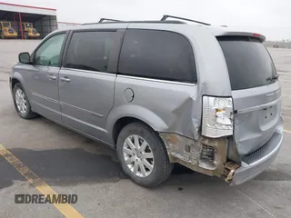 2014 Chrysler Town & Country Touring z VIN 2C4RC1BG1ER225443, wystawiony jako IAAI lot #42057326 z przebiegiem 142 997 mil mil oraz . Historia ofert i sprzedaży dostępna na DreamBid. Obrazek 3.