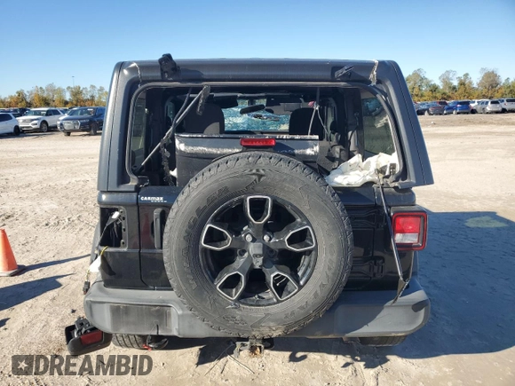 2021 Jeep Wrangler Sport S with VIN 1C4GJXAN1MW665247, listed as a Copart auction lot 84696044 with 71,693 mi miles and Salvage Title. Bid and sale history available at DreamBid. Image 6.