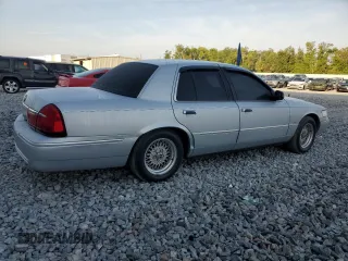 1999 Mercury Grand Marquis LS with VIN 2MEFM75WXXX682027, listed as a Copart auction lot 53906165 with 116,616 mi miles and Salvage Title. Bid and sale history available at DreamBid. Image 3.