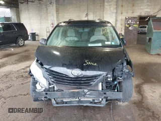 2014 Toyota Sienna LE AAS with VIN 5TDKK3DC7ES426751, listed as a IAAI auction lot 41975870 with 100,000 mi miles and . Bid and sale history available at carsss.com. Image 13.