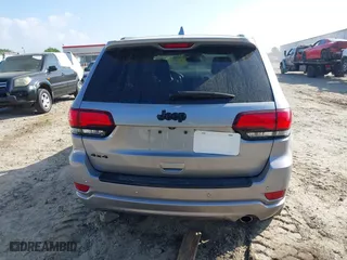2018 Jeep Grand Cherokee Laredo E with VIN 1C4RJFAG0JC284927, listed as a IAAI auction lot 41964013 with 130,145 mi miles. Bid and sale history available at carsss.com. Image 16.