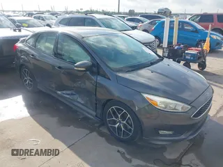 2016 Ford Focus SE z VIN 1FADP3F28GL360512, wystawiony jako IAAI lot #42427723 z przebiegiem 217 172 mil mil oraz . Historia ofert i sprzedaży dostępna na DreamBid. Obrazek 1.