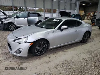 2013 Scion FR-S with VIN JF1ZNAA10D1700449, listed as a Copart auction lot 79005134 with 119,968 mi miles and Salvage Title. Bid and sale history available at DreamBid. Image 1.