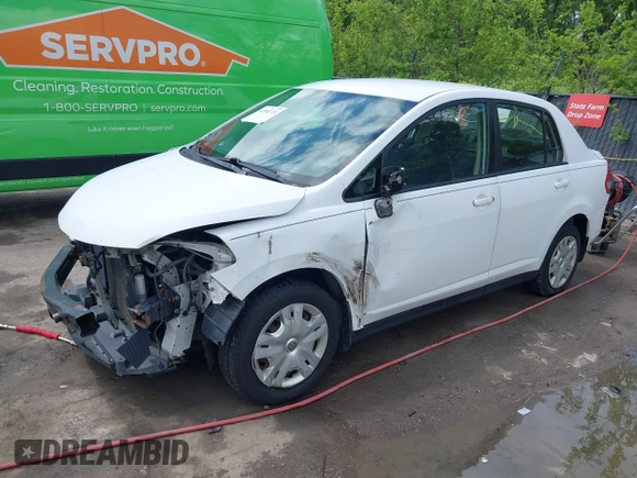 2010 Nissan Versa S with VIN 3N1BC1AP2AL409285, listed as a IAAI auction lot 42182721 with 266,855 mi miles and . Bid and sale history available at DreamBid. Image 21.