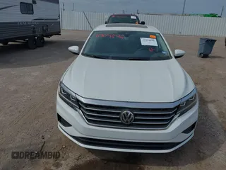 2021 Volkswagen Passat SE z VIN 1VWSA7A30MC016627, wystawiony jako IAAI lot #41904846 z przebiegiem 56 969 mil mil oraz . Historia ofert i sprzedaży dostępna na DreamBid. Obrazek 6.