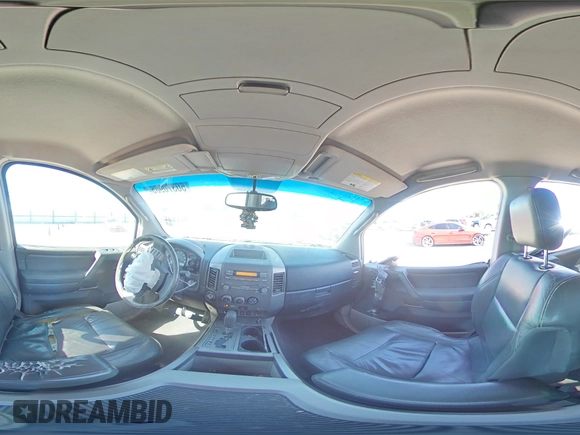 2004 Nissan Titan LE with VIN 1N6AA07B24N575053, listed as a Copart auction lot 50370985 with 230,225 mi miles and Salvage title. Bid and sale history available at DreamBid. Image 12.