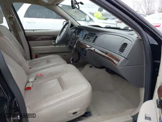 2010 Mercury Grand Marquis LS with VIN 2MEBM7FV5AX631935, listed as a IAAI auction lot 41726717 with 124,139 mi miles. Bid and sale history available at carsss.com. Image 5.