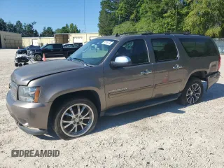 2013 Chevrolet Suburban LS with VIN 1GNSCHE04DR274687, listed as a Copart auction lot 67646174 with 184,268 mi miles and Salvage Title. Bid and sale history available at carsss.com. Image 1.