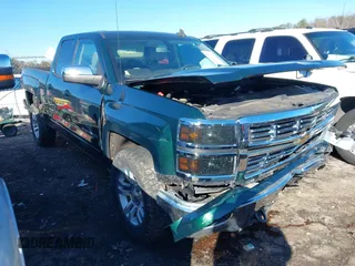2015 Chevrolet Silverado 1500 LT with VIN 1GCRCREHXFZ267054, listed as a IAAI auction lot 41543297 with 134,087 mi miles. Bid and sale history available at carsss.com. Image 1.