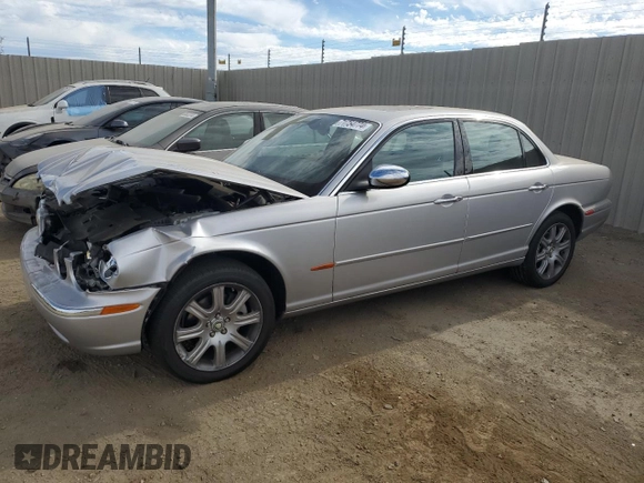 2004 Jaguar XJ with VIN SAJEA74C34SG09548, listed as a Copart auction lot 71754774 with 142,804 mi miles and Salvage Title. Bid and sale history available at DreamBid. Image 1.