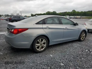 2013 Hyundai Sonata Limited with VIN 5NPEC4AC5DH566029, listed as a Copart auction lot 50945635 with 203,743 mi miles and Salvage Title. Bid and sale history available at DreamBid. Image 3.