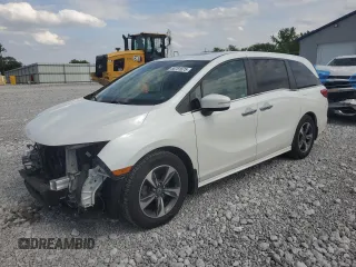 2020 Honda Odyssey Touring z VIN 5FNRL6H86LB036888, wystawiony jako Copart lot #58781675 z przebiegiem 130 329 mil mil oraz Szkoda całkowita • Salvage title. Historia ofert i sprzedaży dostępna na DreamBid. Obrazek 1.