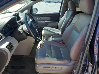 2014 Honda Odyssey Touring with VIN 5FNRL5H96EB068651, listed as a Copart auction lot 51649735 with 157,213 mi miles and Salvage title. Bid and sale history available at DreamBid. Image 7.