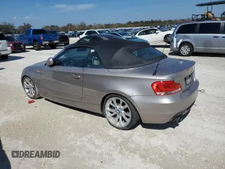 2013 BMW 1 Series 135i with VIN WBAUN7C52DVM26880, listed as a Copart auction lot 77858684 with 0 mi miles and Salvage Title. Bid and sale history available at carsss.com. Image 2.