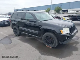 2006 Jeep Grand Cherokee Laredo with VIN 1J4GR48K36C282721, listed as a IAAI auction lot 41437608 with 130,589 mi miles. Bid and sale history available at carsss.com. Image 1.