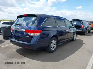 2017 Honda Odyssey SE with VIN 5FNRL5H30HB025472, listed as a IAAI auction lot 42212081 with 33,557 mi miles and . Bid and sale history available at carsss.com. Image 4.