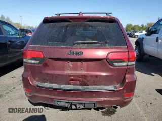 2018 Jeep Grand Cherokee Laredo E with VIN 1C4RJFAG1JC130386, listed as a Copart auction lot 52999085 with 69,304 mi miles and Salvage Title. Bid and sale history available at DreamBid. Image 6.