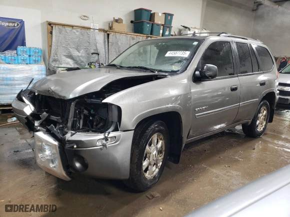 2006 GMC Envoy SLE with VIN 1GKDT13S762185578, listed as a Copart auction lot 44587735 with 310,991 mi miles and Salvage Title. Bid and sale history available at carsss.com. Image 1.