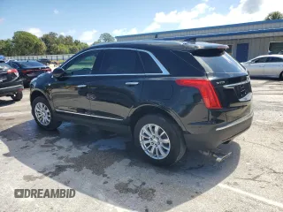 2019 Cadillac XT5 FWD with VIN 1GYKNARS9KZ219259, listed as a Copart auction lot 56900625 with 58,739 mi miles and Non repairable. Bid and sale history available at DreamBid. Image 2.